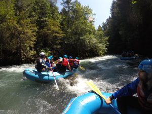 Some members of PLUS QA team in a raft on White Salmon River