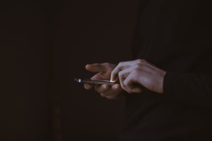 Image of hands holding a smartphone