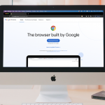A macbook on the Chrome download screen, next to an iPhone on the Safari information page, demonstrating two of the top browsers for 2022, on both desktop and mobile