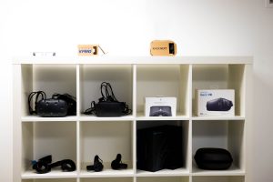 VR devices on a shelf in the PLUS QA device library