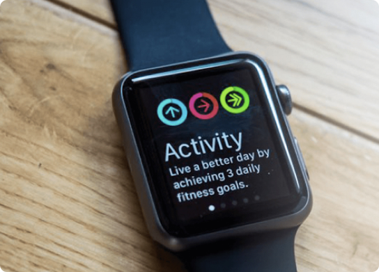 View of Apple Watch device with Activity screen active
